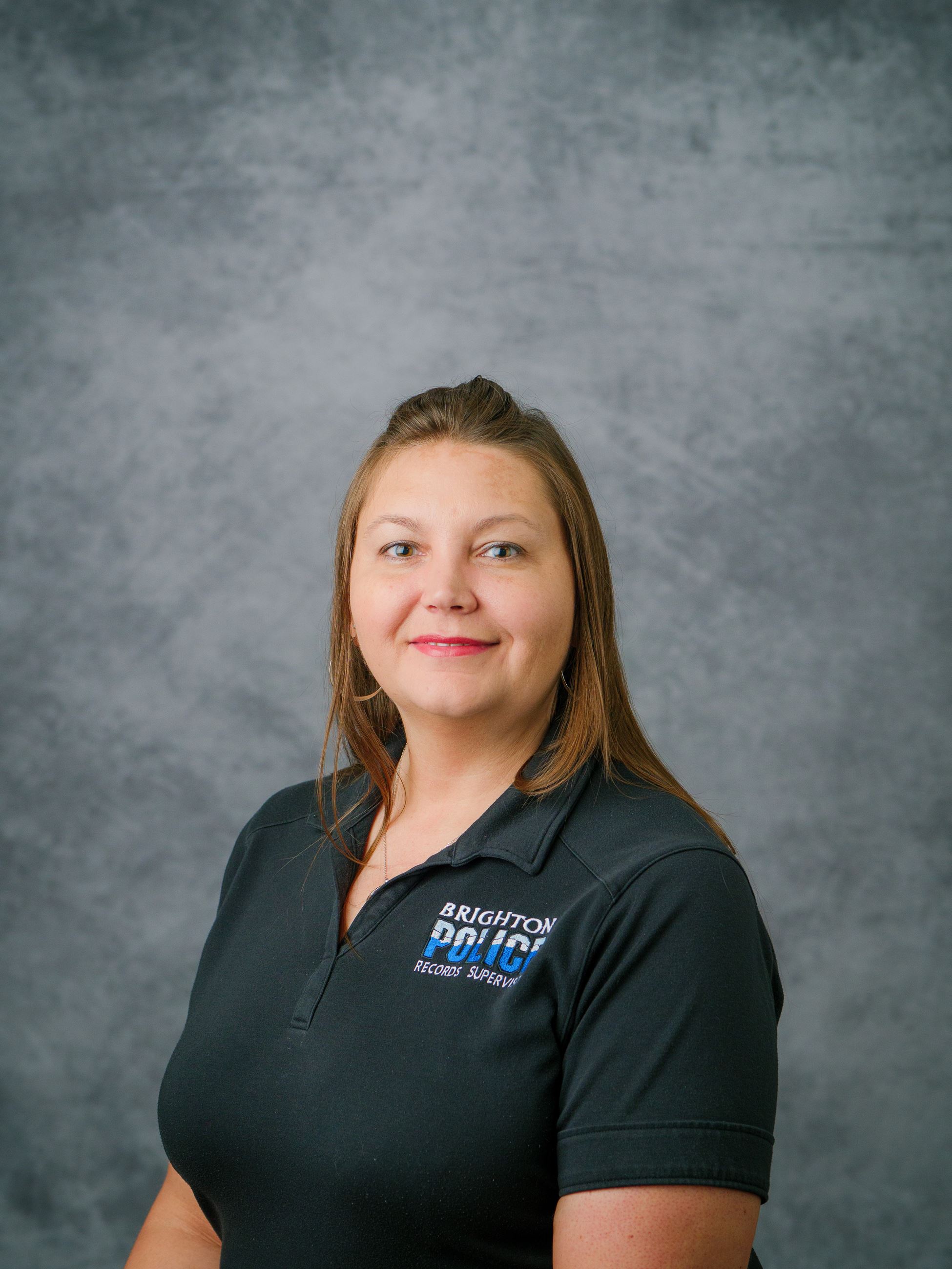 FEMALE IN RECORDS SUPERVISOR POLO