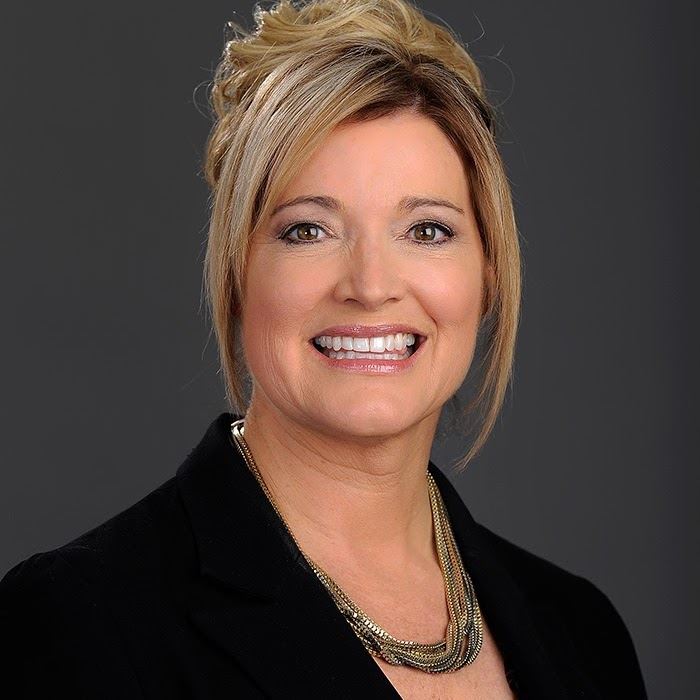 Headshot of woman named Karen Borkowski Surine